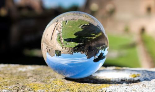 Close-up of crystal ball with reflection