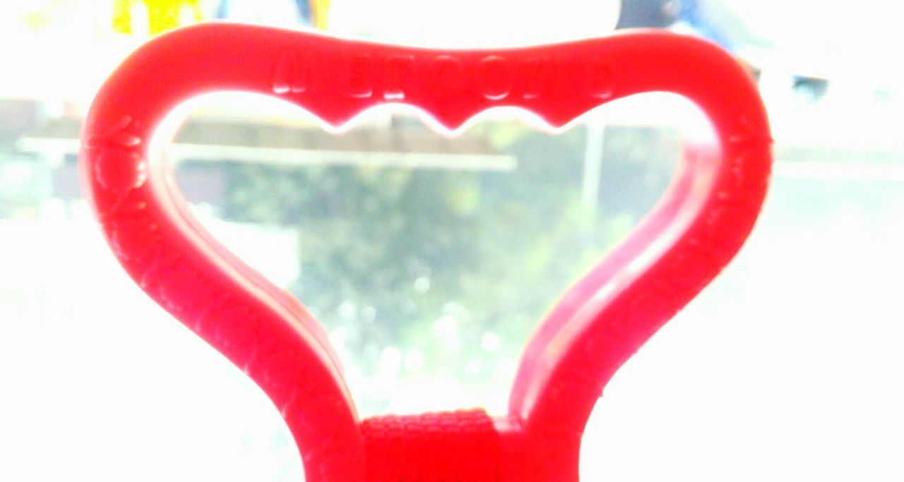 CLOSE-UP OF HEART SHAPE MADE FROM RED INDOORS