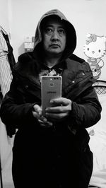 Close-up of man holding drink