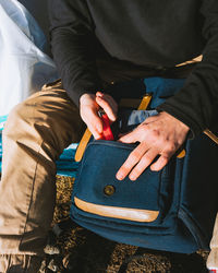 High angle view of man holding hands