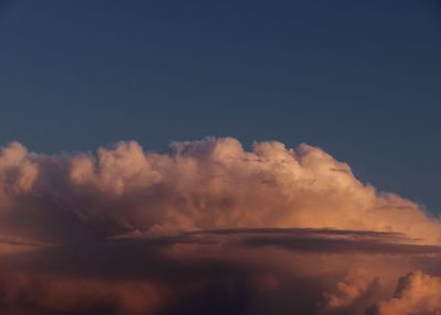Low angle view of clouds in sky during sunset