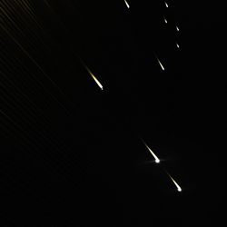 Low angle view of illuminated star field at night