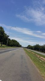 Road against cloudy sky