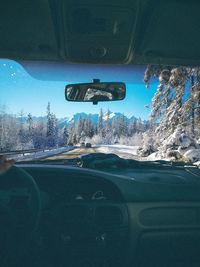 Close-up of car on road during winter