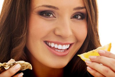 Portrait of woman eating ice cream