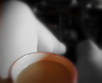 Close-up of coffee cup on table