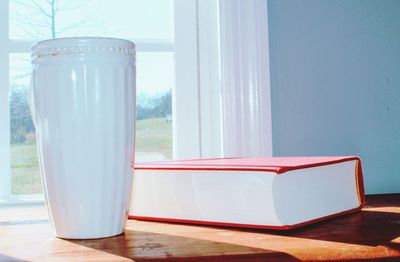 Close-up of coffee cup on table