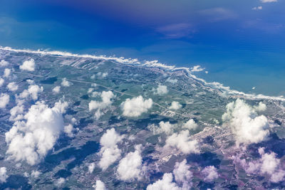 High angle view of cloudscape over sea against sky