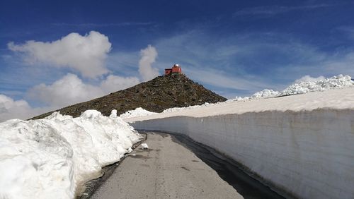 Snow covered mountain against sky