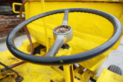 Close-up of yellow machine