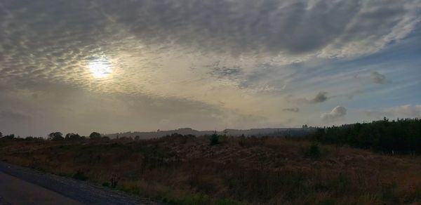 Scenic view of landscape against sky during sunset