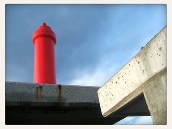 Low angle view of built structure against blue sky