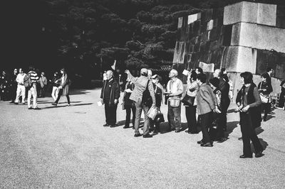 People walking on street in city