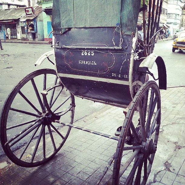 transportation, bicycle, mode of transport, land vehicle, stationary, wheel, parked, parking, street, built structure, building exterior, architecture, outdoors, day, no people, sidewalk, old, travel, city, car