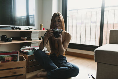 Young woman using mobile phone