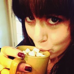 Close-up of woman eating food