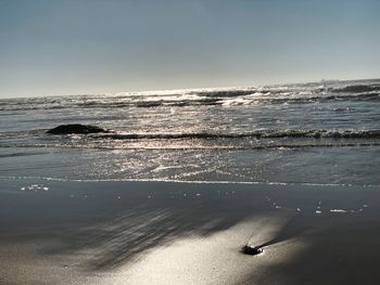 Scenic view of sea against clear sky