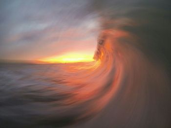 Scenic view of sea at sunset