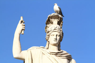 Statue of the goddess flora, piazza del popolo rome, sunset time.