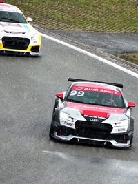 Close-up of cars on road