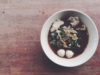 Directly above shot of soup in bowl on table