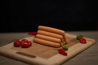 Close-up of fruits served on cutting board