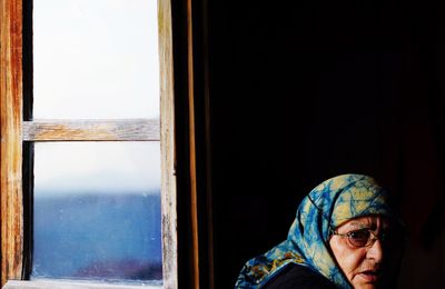 Portrait of senior woman wearing headscarf