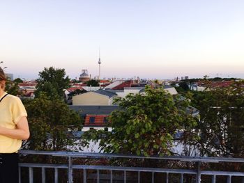 View of cityscape against clear sky