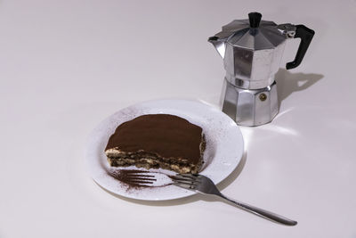 Close-up of coffee cup against white background