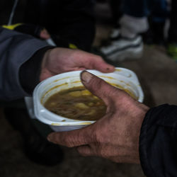 Close-up of man holding ice cream