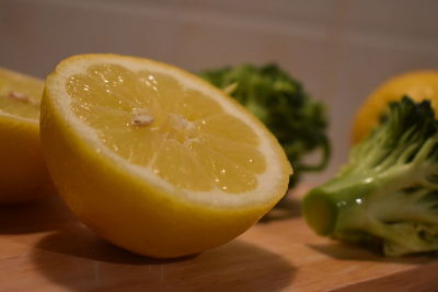 Close-up of lemon slice on cutting board