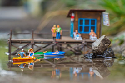 Toys on boat in lake
