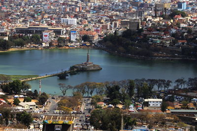 High angle view of river by buildings in city