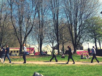 People walking on footpath in park