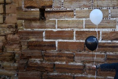Low angle view of brick wall