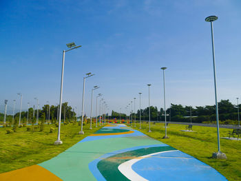 View of pathway field for roller vehicle against sky