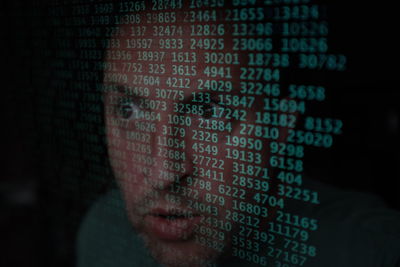 Digital composite image of man using mobile phone