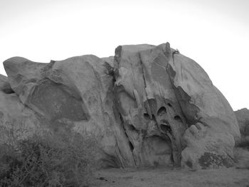 Rock formations against clear sky