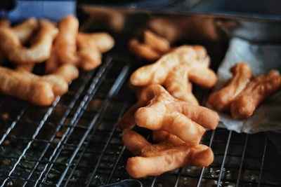 Close-up of meat on barbecue grill