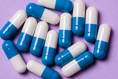 Close-up of pills on white background