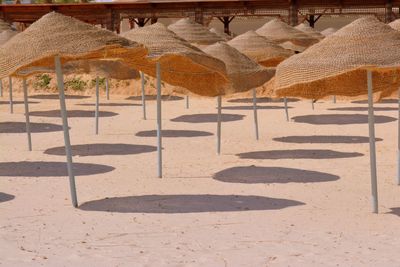 Shadow of woman on beach