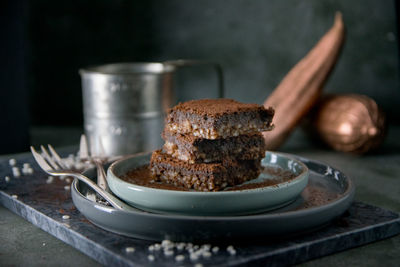 Close-up of brownie in plate on table