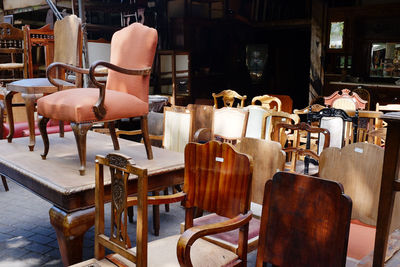 Empty chairs and tables in restaurant