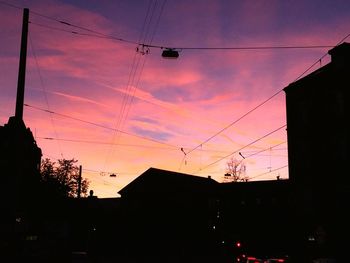 Low angle view of electricity pylon against sky