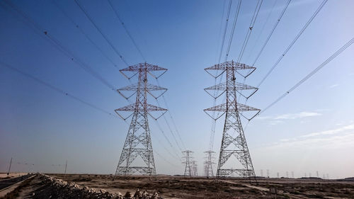 Low angle view of electricity pylon