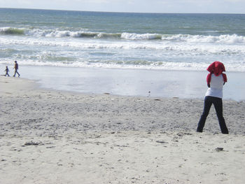 People enjoying at beach