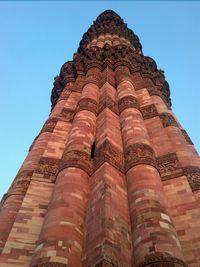 Low angle view of built structure against blue sky