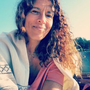 Portrait of smiling young woman outdoors