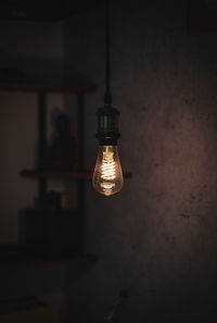 Close-up of illuminated light bulb