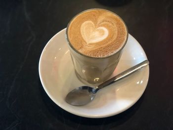 High angle view of coffee cup on table